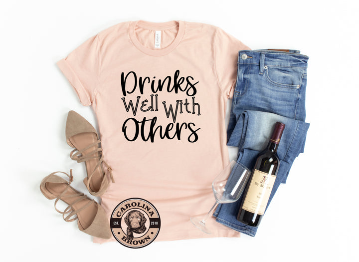 Drinks Well with Others peach t-shirt